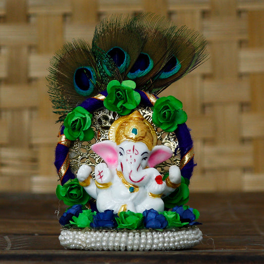 Lord Ganesha Idol on Decorative Handcrafted Floral Plate with Peacock Feather